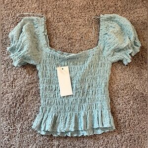 Lush Blue Blouse with Elegant Design